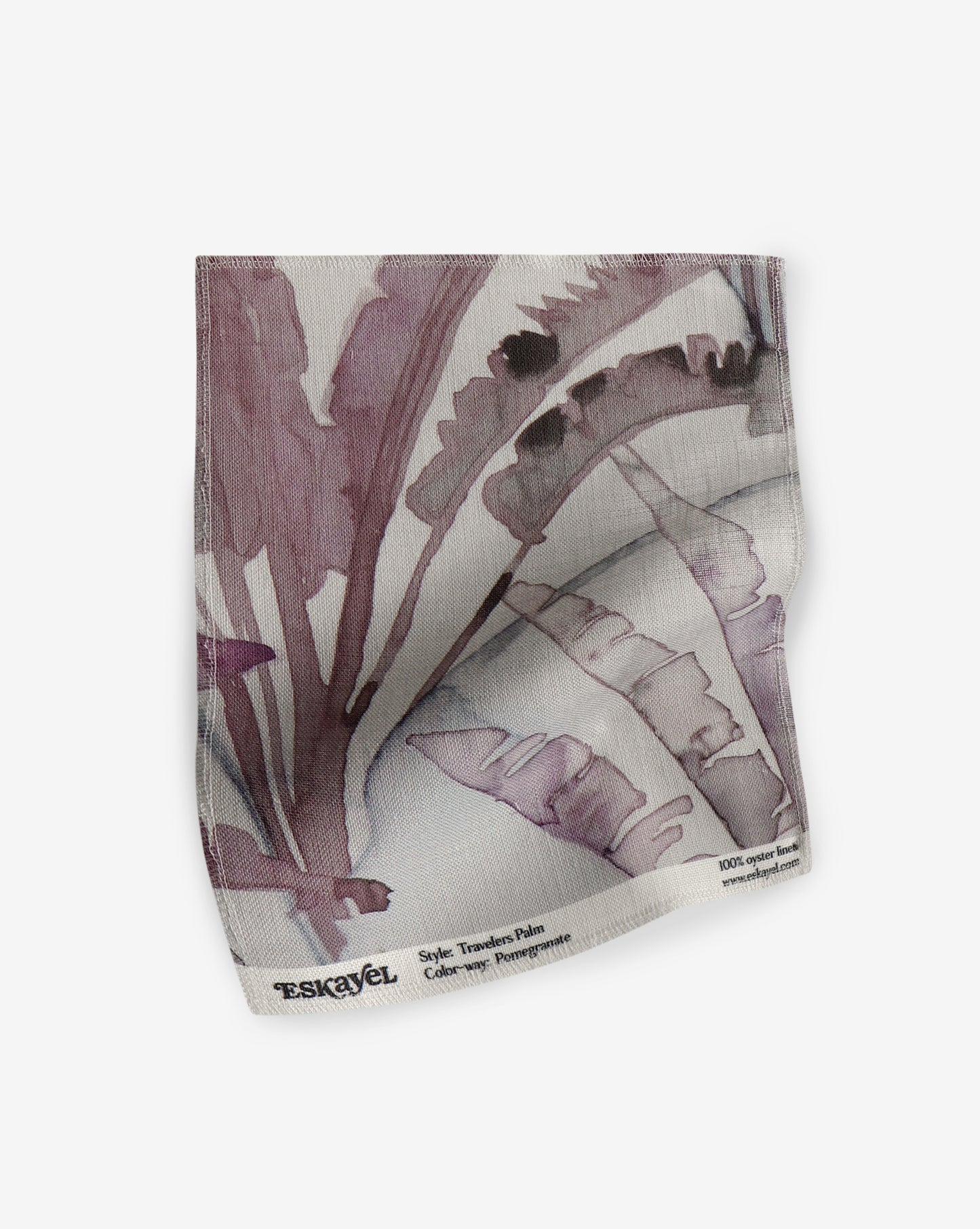 A luxury Travelers Palm Fabric hand fabric with a purple and white pattern on it