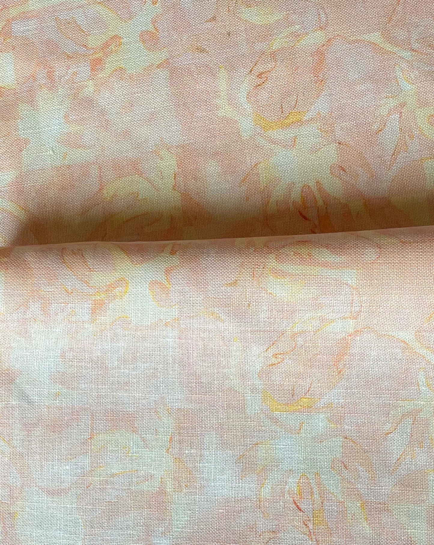 Yaya fabric in Grapefruit — beach-themed graphic botanical fabric in pale peach with highlights of light yellow | Eskayel
