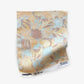 Yaya fabric in Husk as a swatch — beach-themed graphic botanical fabric in creamy yellow, earthy brown, and light blue | Eskayel