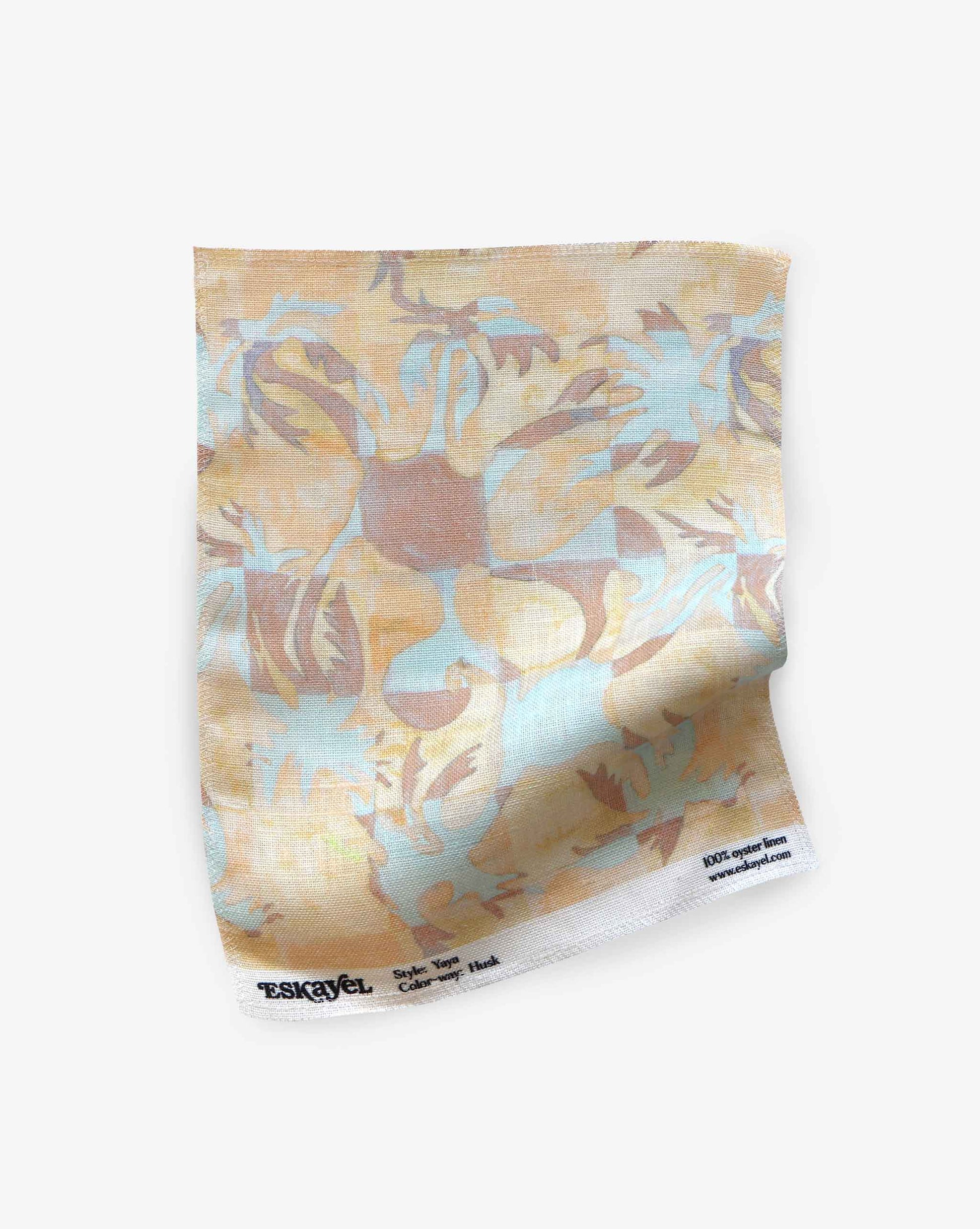 Yaya fabric in Husk as a swatch — beach-themed graphic botanical fabric in creamy yellow, earthy brown, and light blue | Eskayel