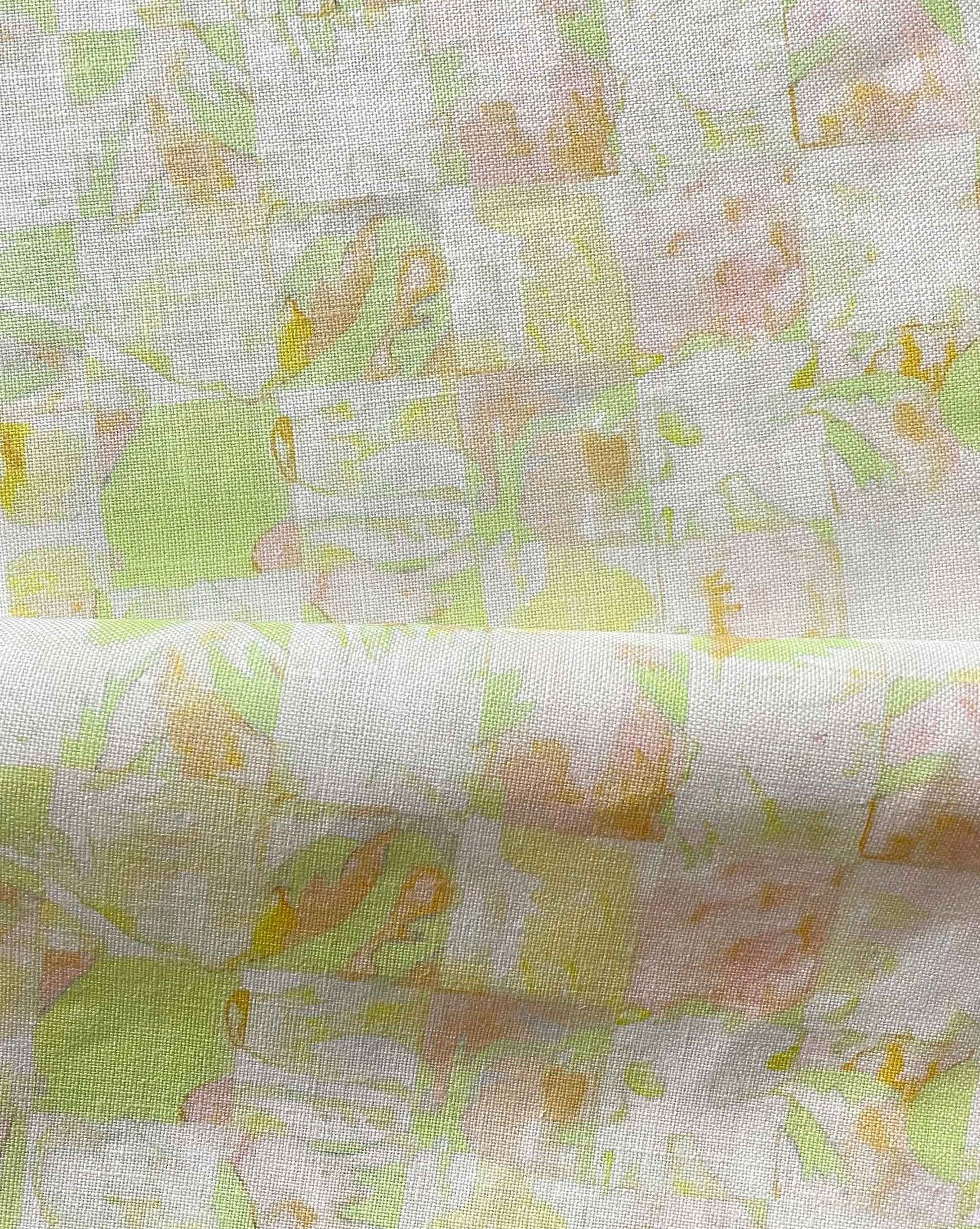 Yaya fabric in Limeade — beach-themed graphic botanical fabric in light yellow, lime green, and peach | Eskayel