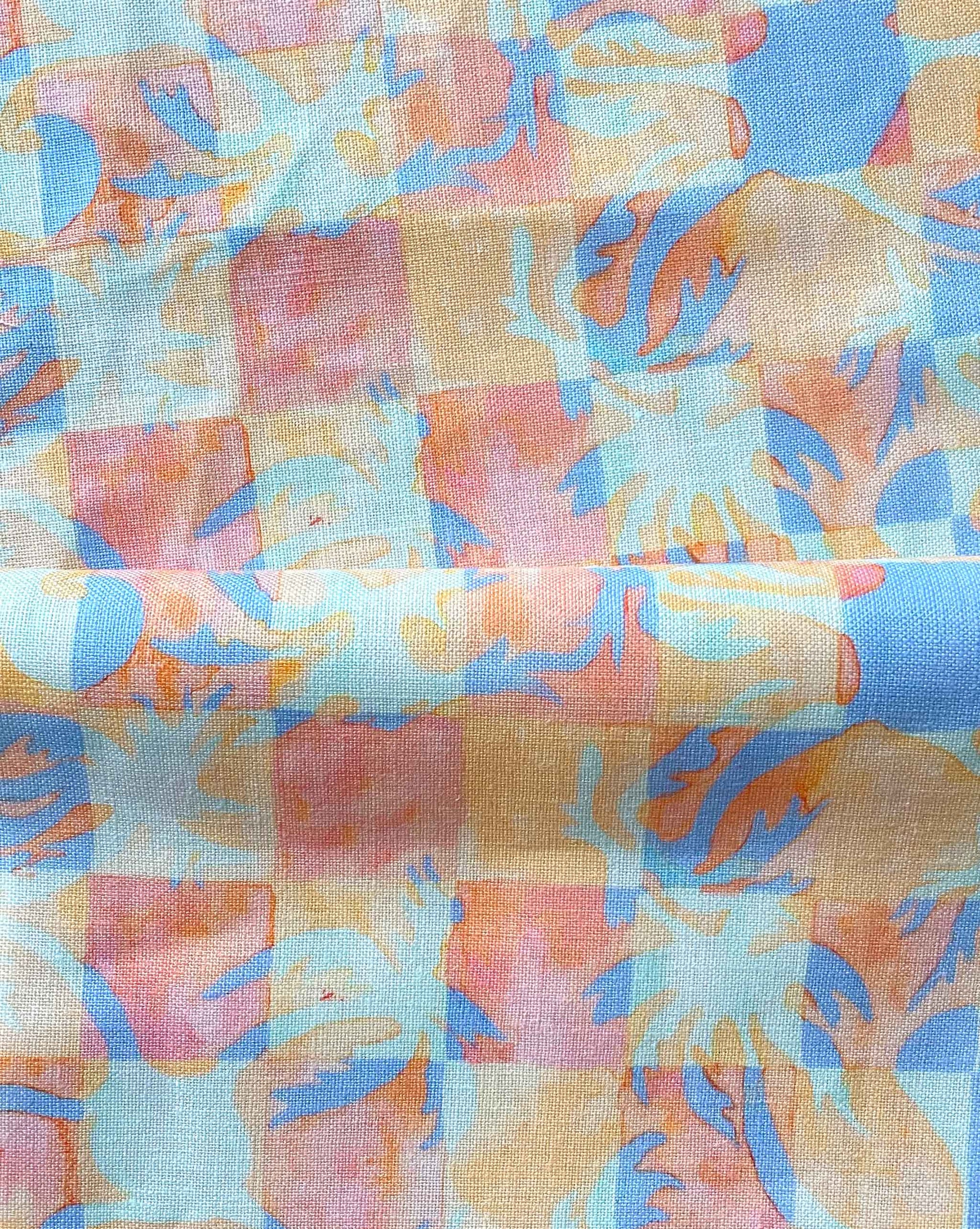 Yaya fabric in Punch — beach-themed graphic botanical fabric in bright pink, peach, periwinkle blue, and pale turquoise | Eskayel