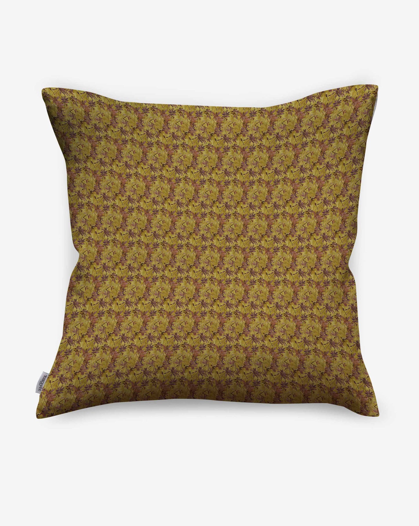 A pillow in Eskayel’s Alhelí, a tiny repeating pattern in the green-based colorway Jasmine.