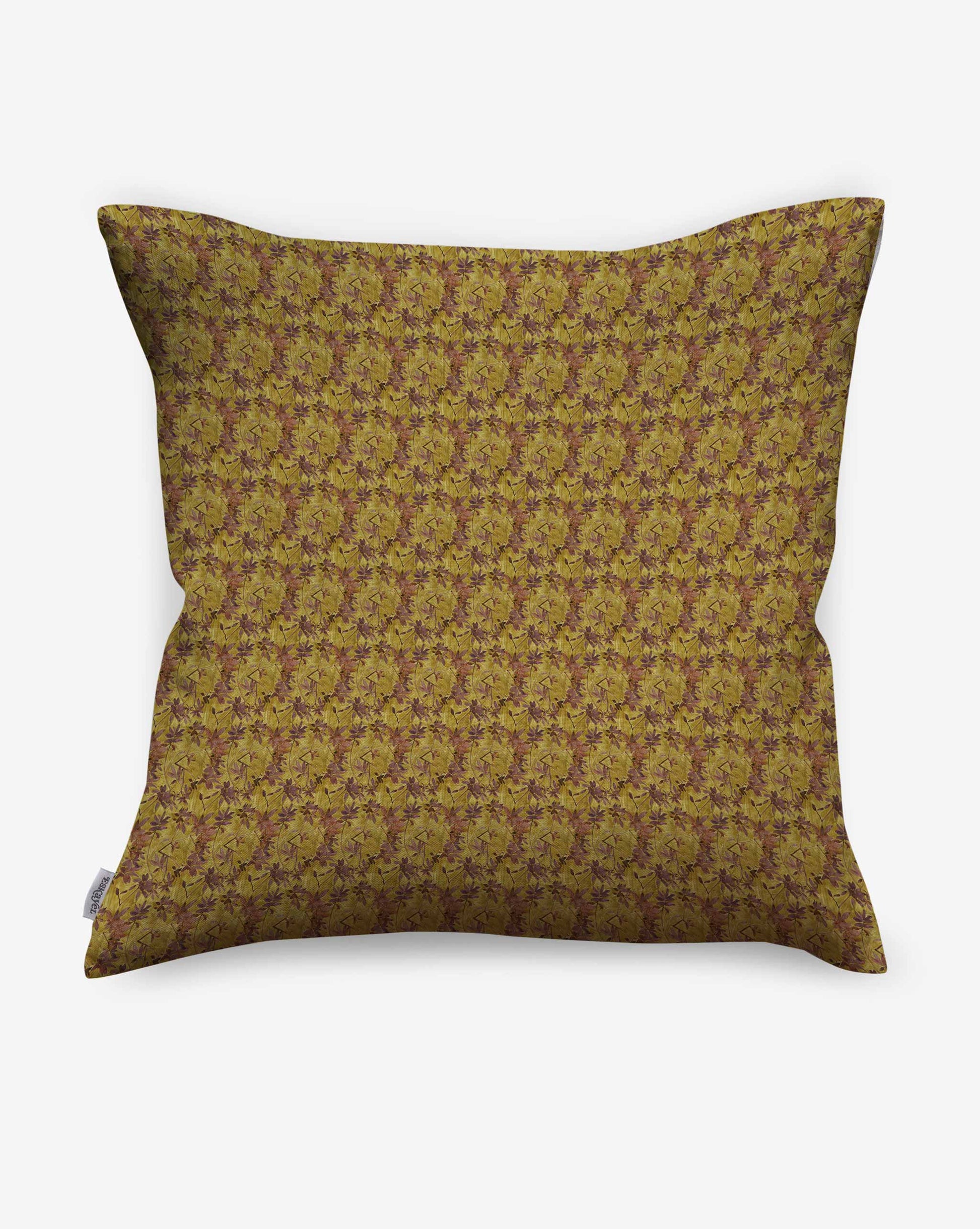A pillow in Eskayel’s Alhelí, a tiny repeating pattern in the green-based colorway Jasmine.