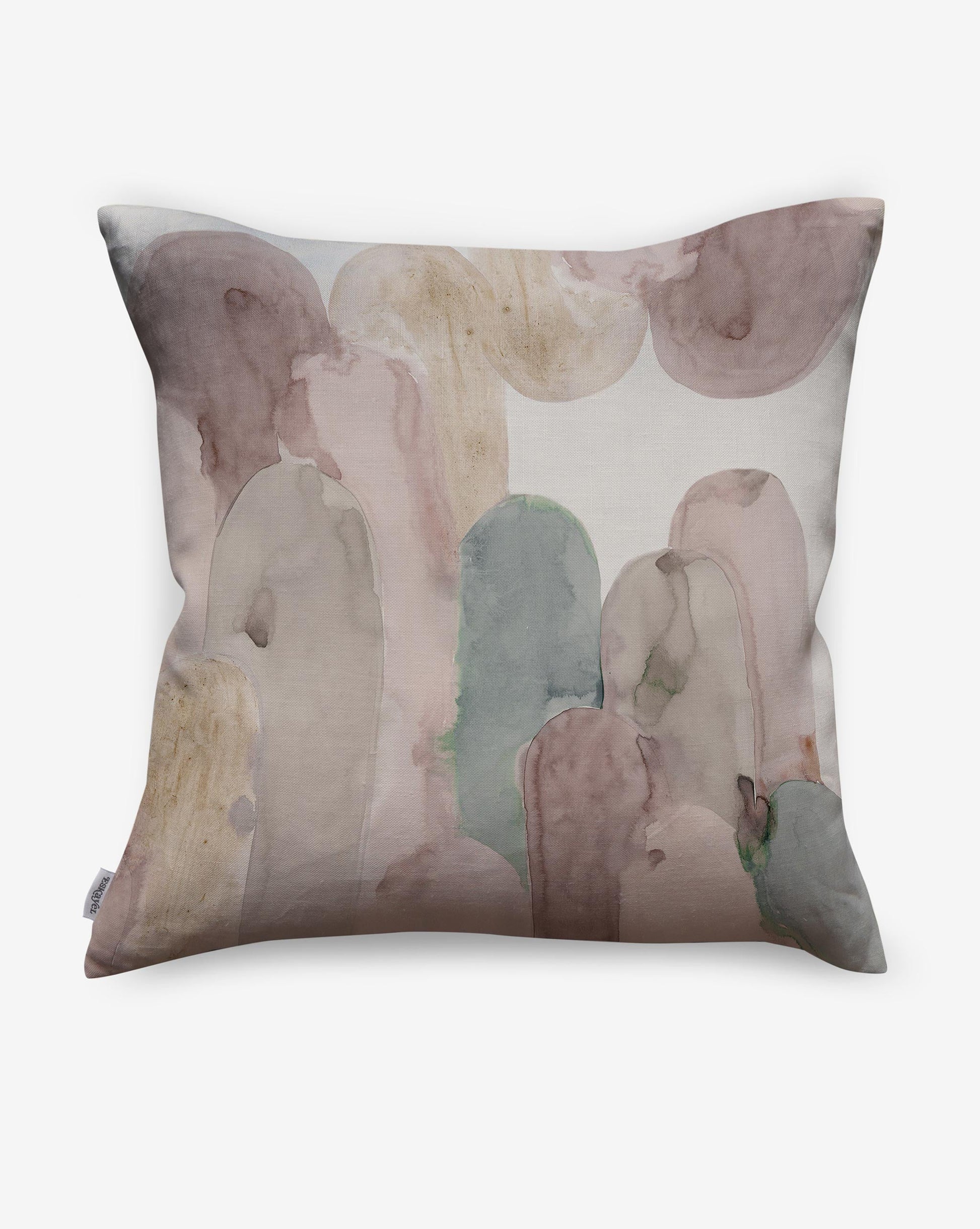 Arcos luxury pillows in Dusk offer muted pinks and sage green as a soft geometric pattern of curves and columns