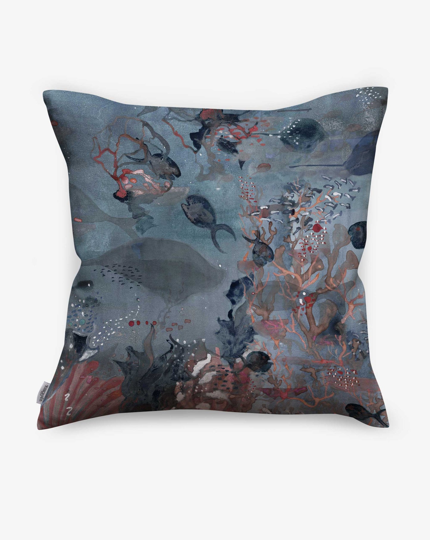 Atoll linen pillows in Ocean combine blue hues in a watery, atmospheric design.