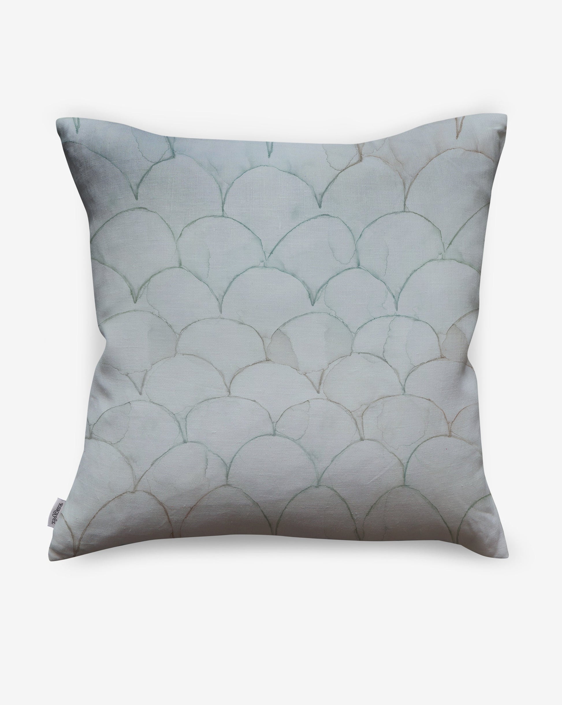 Baby Scallops pillows in Sage present watery teal tones as a geometric pattern of overlapping curves.