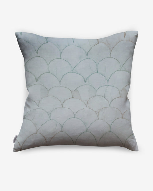 Baby Scallops pillows in Sage present watery teal tones as a geometric pattern of overlapping curves