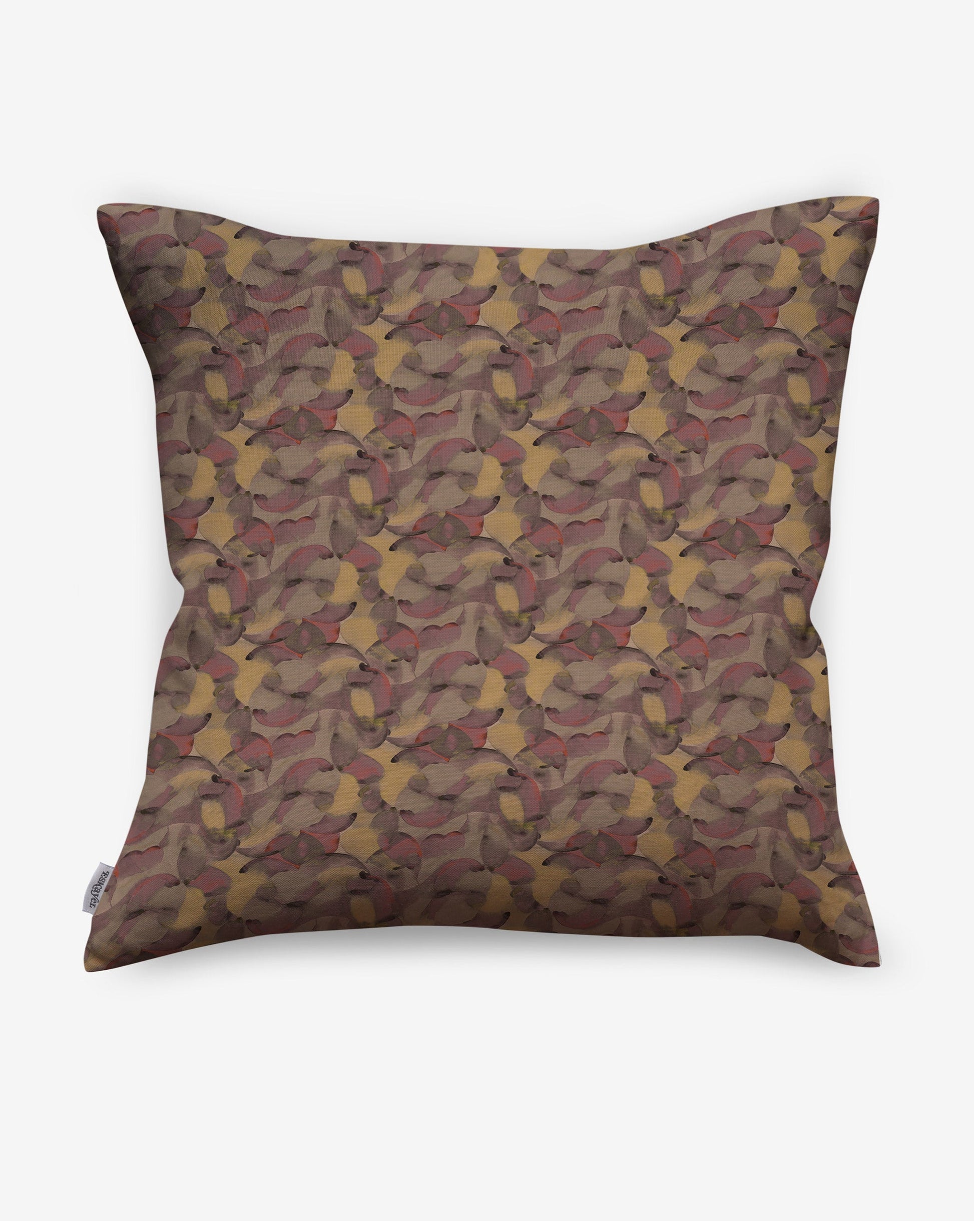 Orbs linen fabric by Eskayel is available as pillows in earthy multicolor Rhubarb.