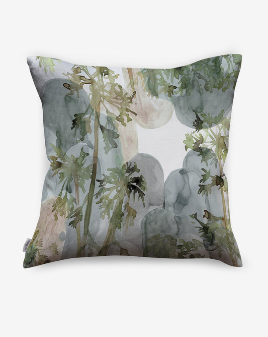A watercolor image of plants and flowers adorns the Papaya Arc Pillow 22' x 22' in the Sage Colorway