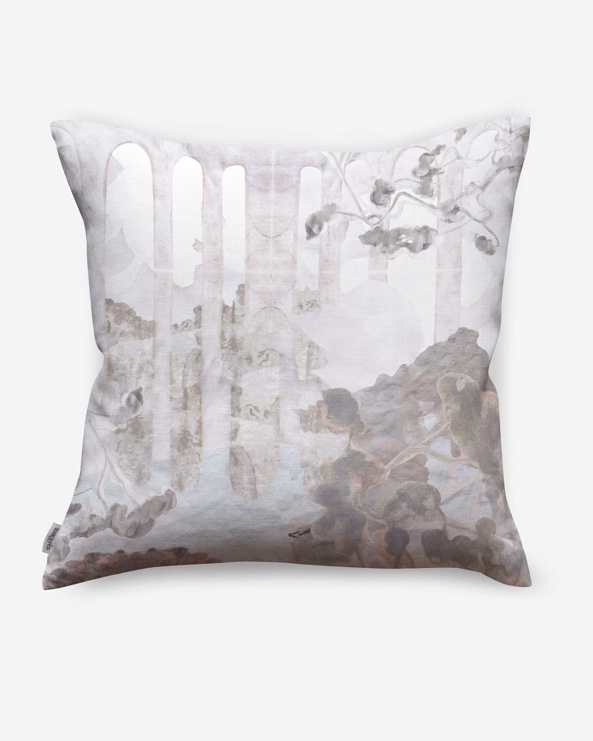 A pillow with an image of trees