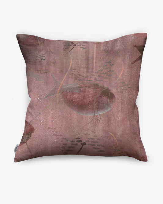 Pillows made in the Shoal pattern and Coral colorway feature tropical fish in red tones.