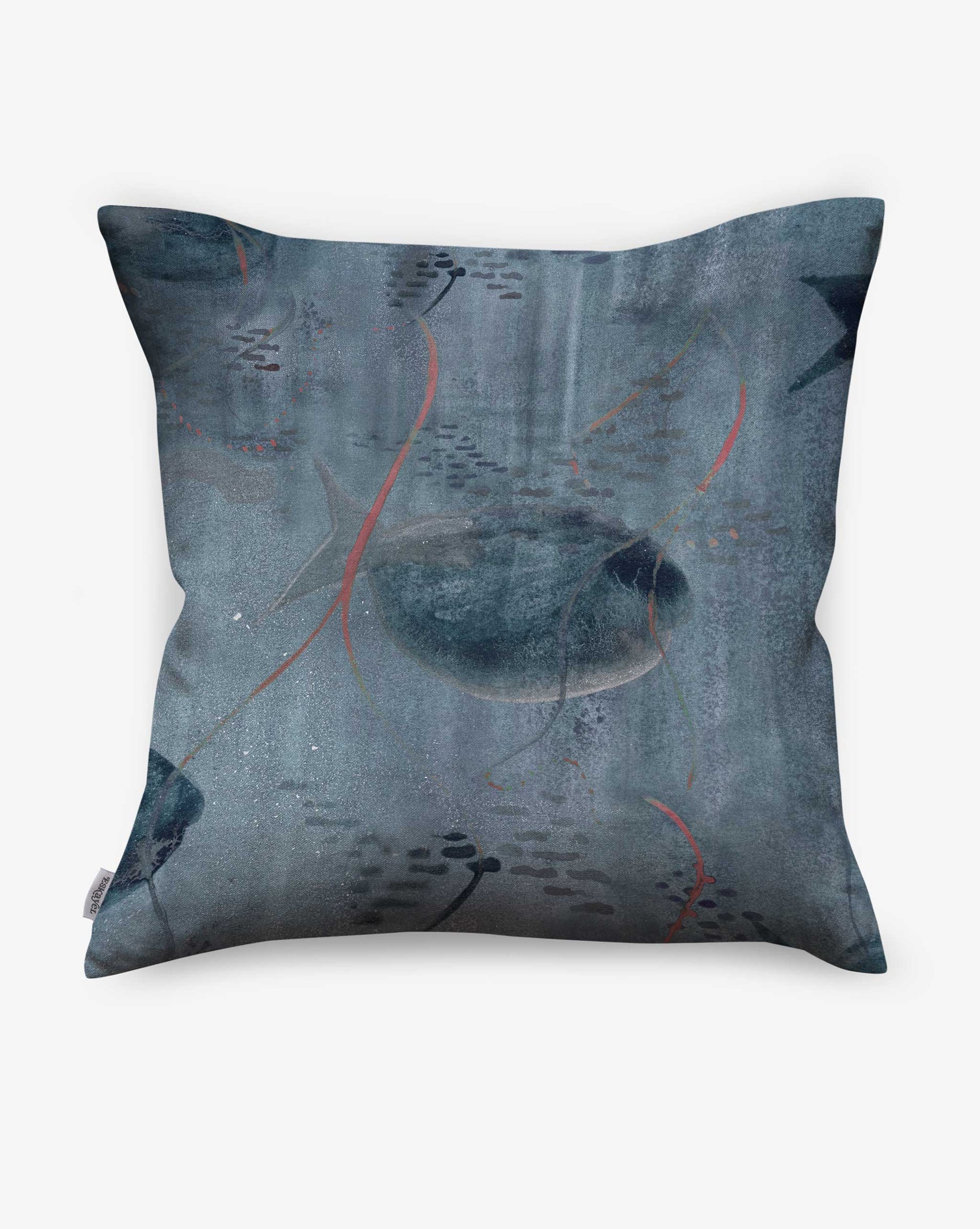 Custom Shoal pillows in the Ocean palette depict tropical marine life in blue.