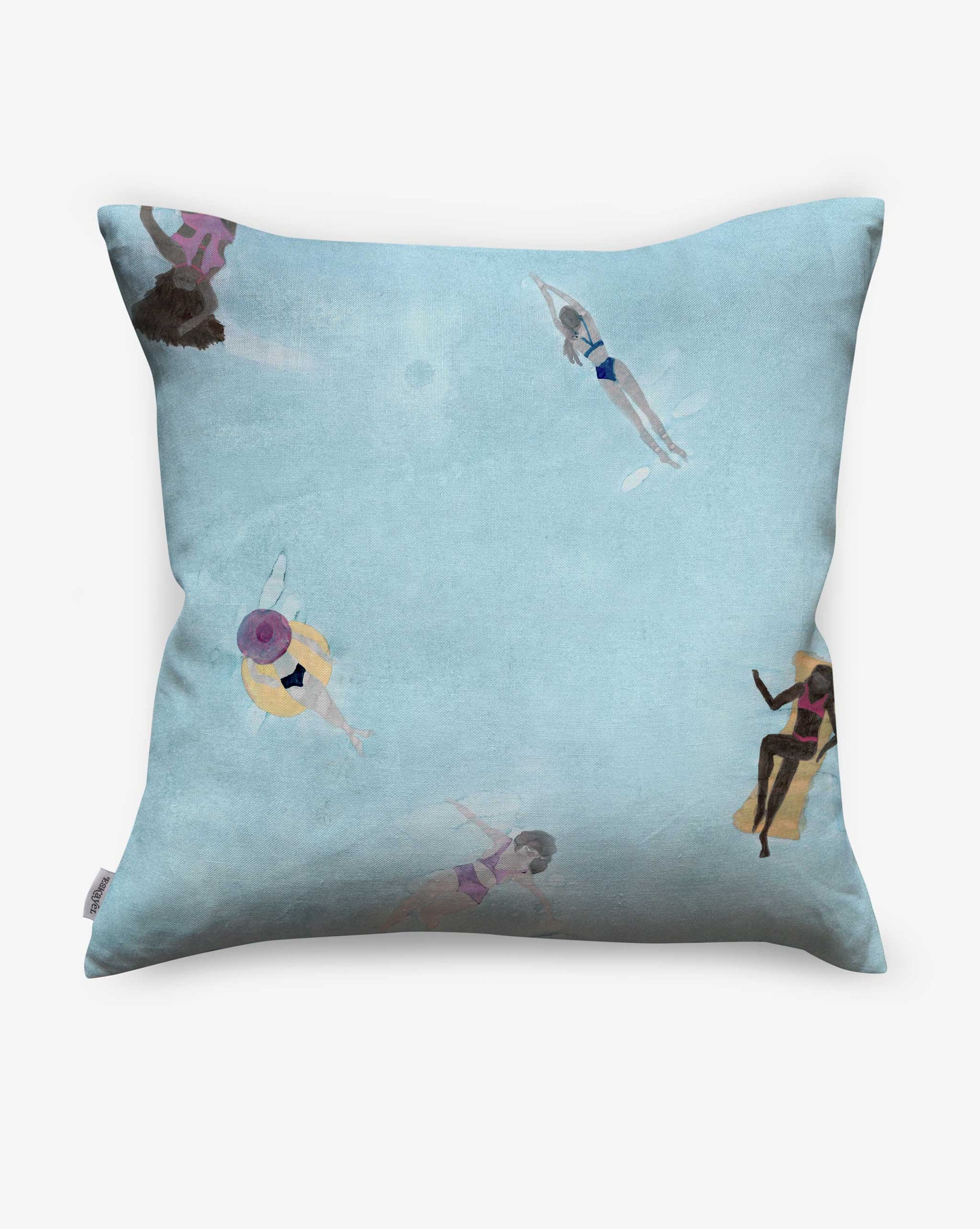 The Swim Pillow Sea is a light blue cover featuring a playful print of people swimming and floating in a pool, as seen from above on the back.