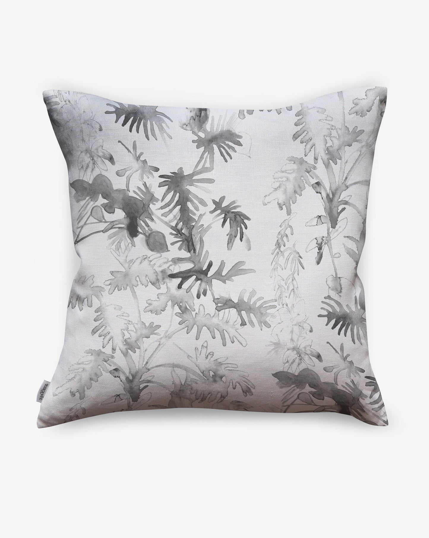 Topiary custom pillows in Birch feature houseplant silhouettes in grey and black. 