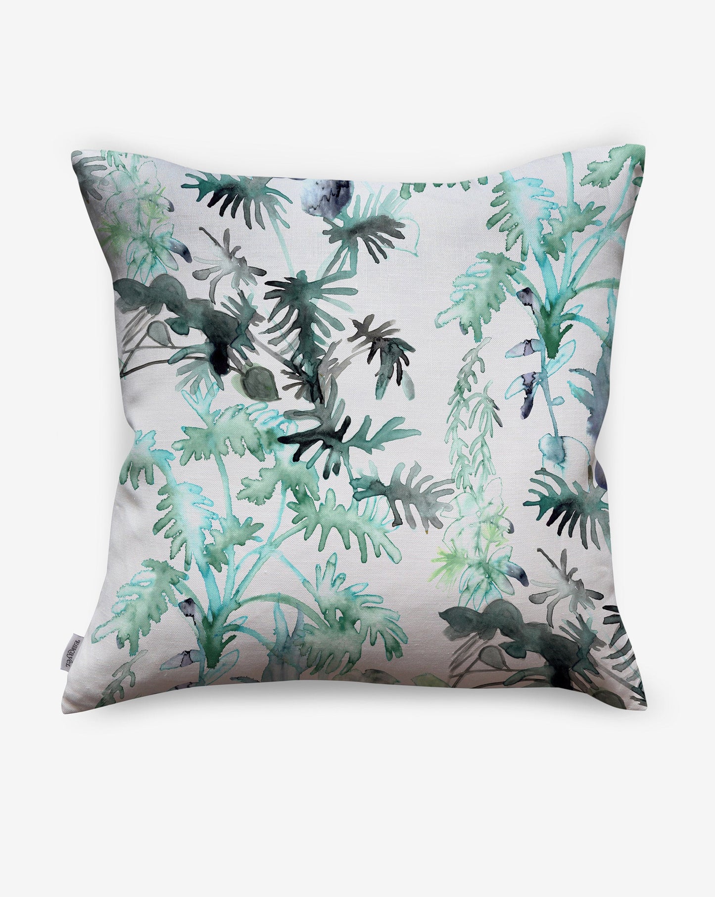 Topiary custom pillows in Spruce display silhouettes of houseplants in turquoise, blue, and green.