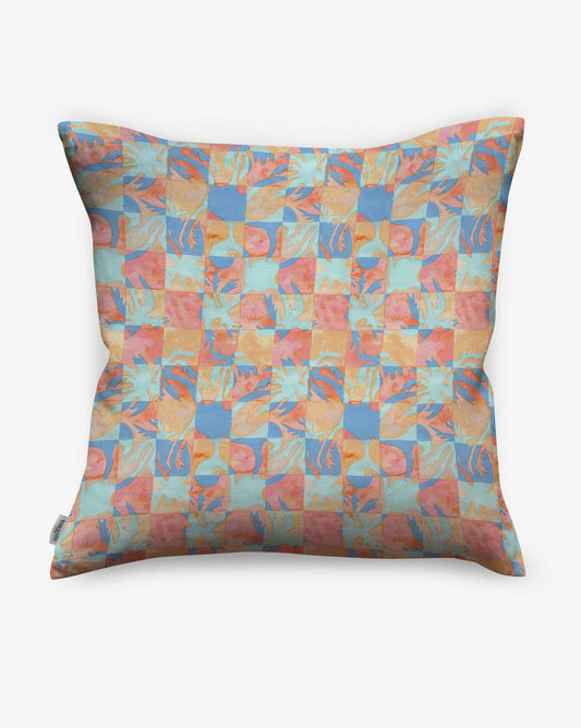Yaya pillow in Punch as a swatch — beach-themed graphic botanical pattern in bright pink, peach, periwinkle blue, and pale turquoise | Eskayel