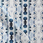 A blue and white fabric with an abstract pattern, made of Bali Stripe Performance Fabric Indigo