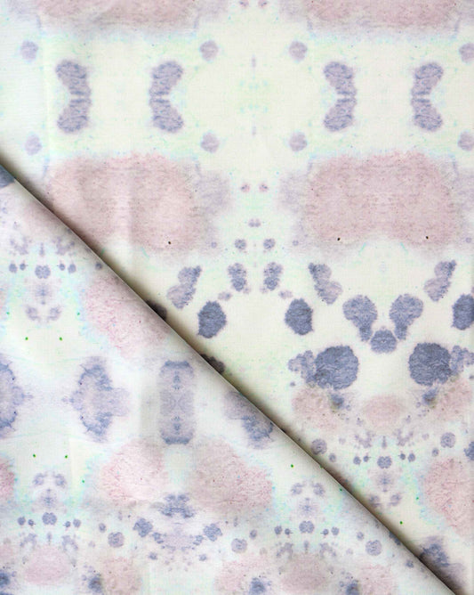 Eskayel's Species Hide pattern with its kaleidoscopic effect showcasing pink and blue colors on performance fabric.