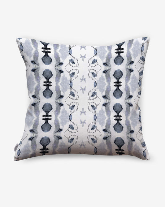 A Bali Stripe Outdoor Pillow Indigo with a blue and white abstract aesthetic design on it