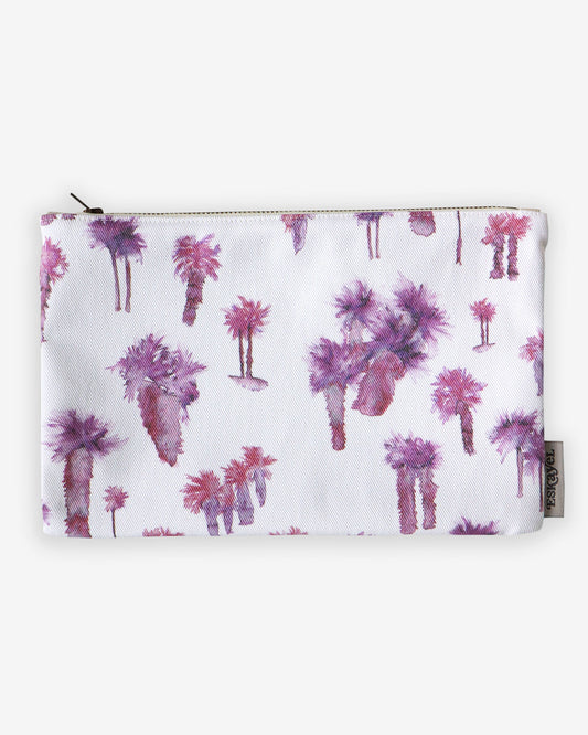 A Perfect Palm Pouch Persimmon, perfect as a carryon bag for a fun and vibrant look