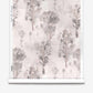Aionas Silk Wallcovering Alba paper-backed wallpaper roll with a repeating watercolor print of abstract, grey-toned trees in a nature-inspired design.