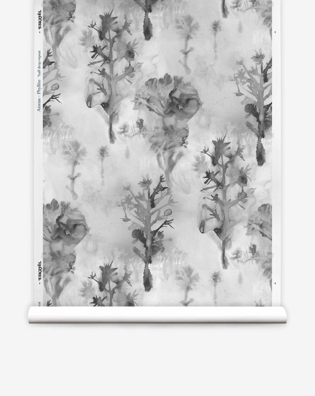 Aionas Silk Wallcovering in Phyllite, featuring a repeating watercolor pattern of abstract grey flowers and foliage on a textured white, paper-backed background.