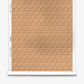 A roll of Alhelí Silk Wallcovering in Frangipani, featuring an all-over repeating pattern of brown star-shaped flowers on a textured tan background.