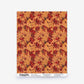 Alhelí Silk Wallcovering in Golden Hour featuring a biophilic repeating pattern of dark red flowers and foliage on a textured orange background.