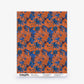 Alhelí Silk Wallcovering in Lobelia, featuring a pattern of blue flowers and foliage on a textured orange background.
