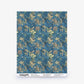 Alhelí Silk Sample in Tide Pool, featuring a blue fabric swatch with a botanical pattern of green, gold, and brown leaves; click to order sample.