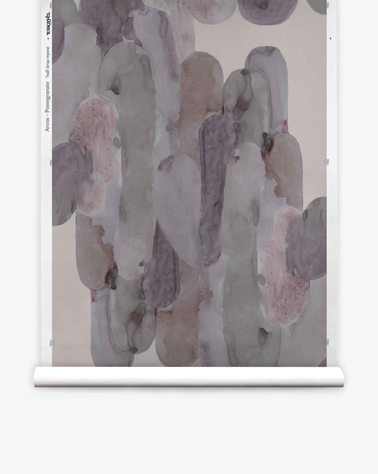 Arcos Silk Wallcovering||Pomegranate showcases abstract, hand-painted wallpaper with overlapping vertical oval brushstrokes in muted gray, mauve, and brown tones set against a light background.