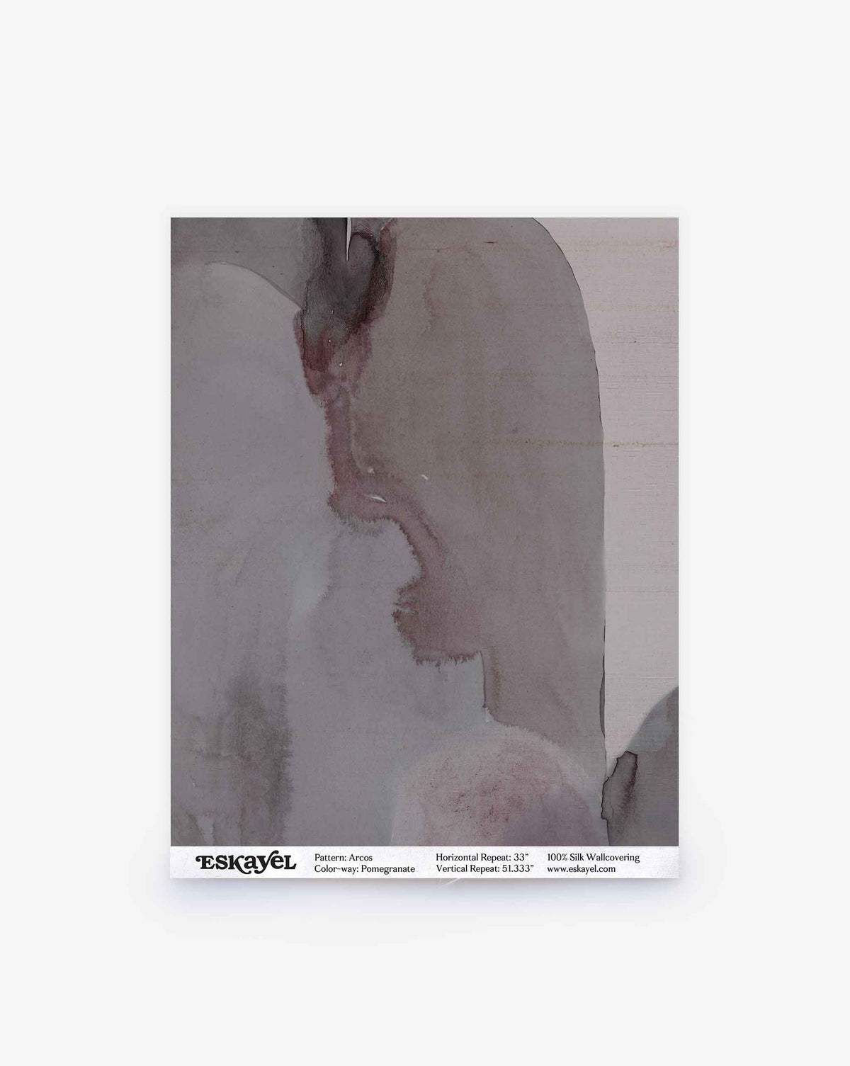 Abstract watercolor painting in muted grays, mauves, and pinks. The artwork label at the bottom reads “Arcos Silk Sample || Pomegranate.” Order a sample to experience the subtle elegance of this unique design firsthand.