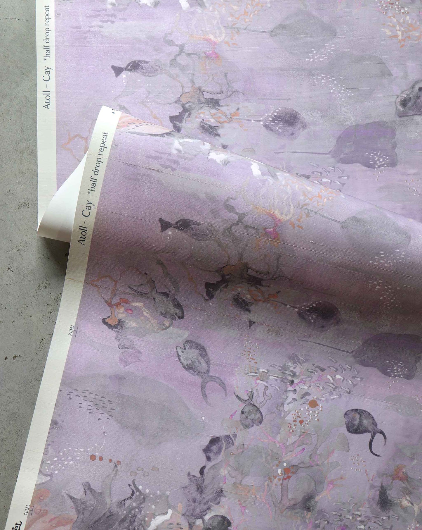 A close up detailed shot of Eskayel’s Atoll wallpaper in Cay with its purple hues. 