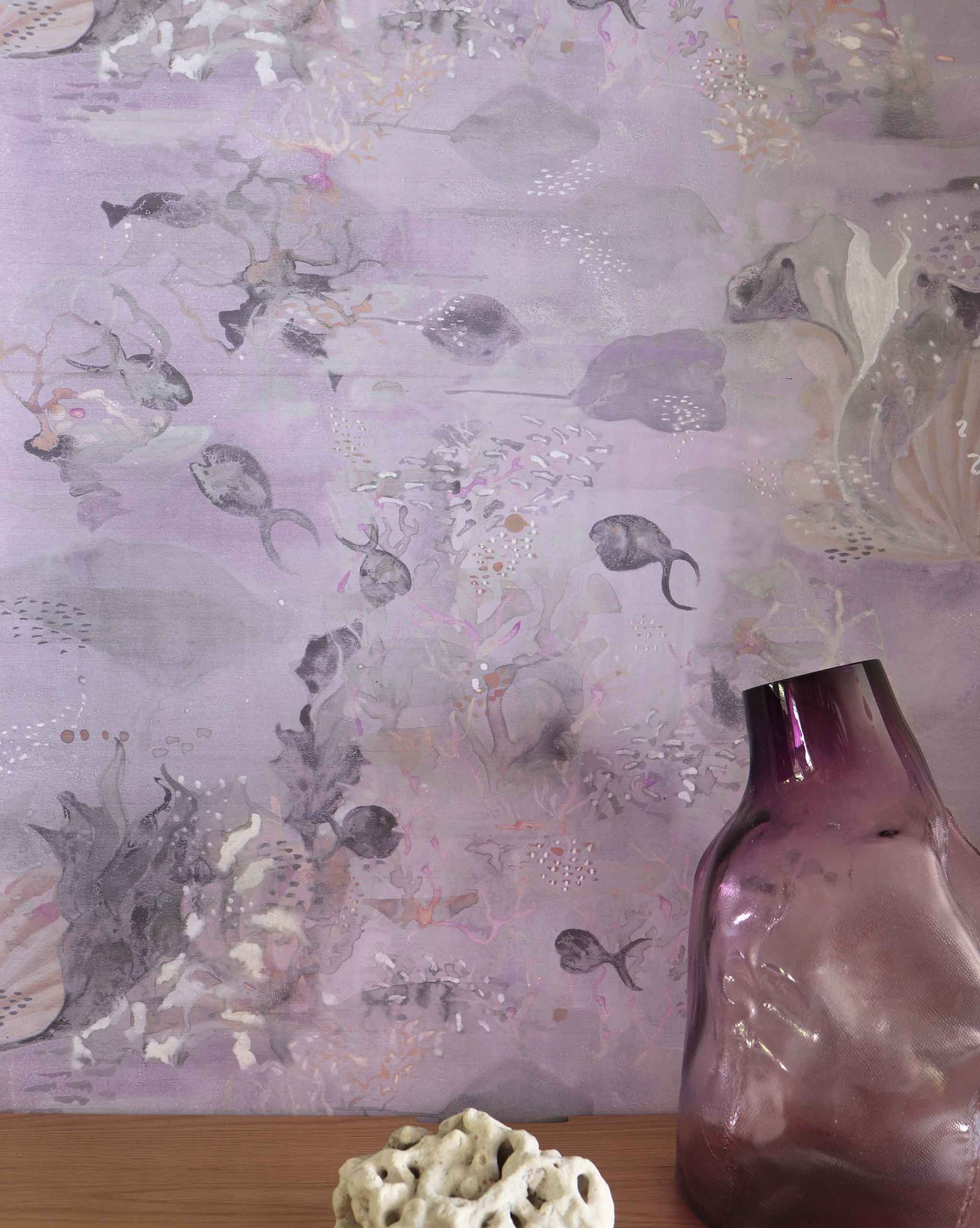 Eskayel’s Atoll wallpaper in Cay with its purple hues is printed on a paper backed silk and installed in a room.