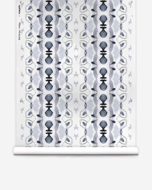 Bali Stripe Silk Wallcovering in Indigo featuring a repeating pattern of dark blue ink-wash shapes and thin, spindly line art.