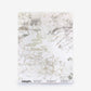 Bosky Toile Silk Wallcovering in an abstract, watercolor-style grey and green mottled design featuring line-drawn branch silhouettes at the bottom.