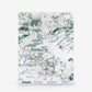 Bosky Toile Silk Wallcovering in Chloros, featuring green and white abstract watercolor with detailed line-drawn branches at the bottom.