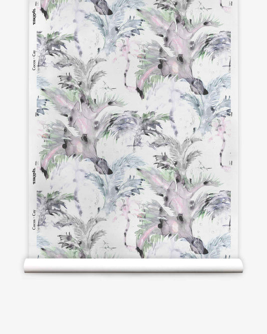Introducing the Cocos Silk Wallcovering||Cay: a roll of elegant wallpaper showcasing a repeating watercolor design with anteaters and lush foliage, accented by subtle palm tree motifs in soft pastel tones on a crisp white background.