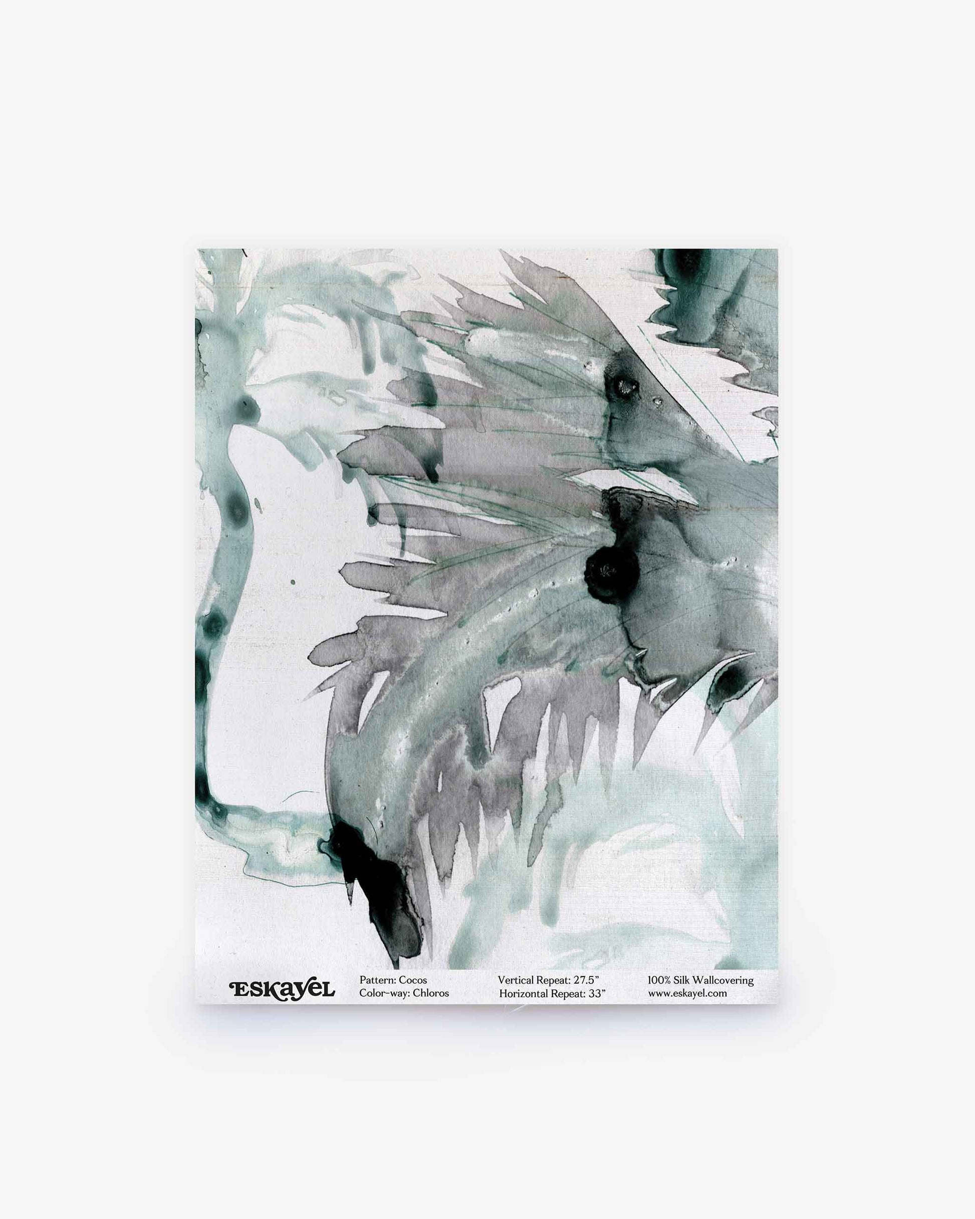 Abstract watercolor art with green and black brushstrokes on white paper, featuring jagged and fluid shapes. Text at the bottom includes the product name “Cocos Silk Sample,” colorway “Chloros,” and material information. Order a sample to experience its unique texture and visual impact firsthand.
