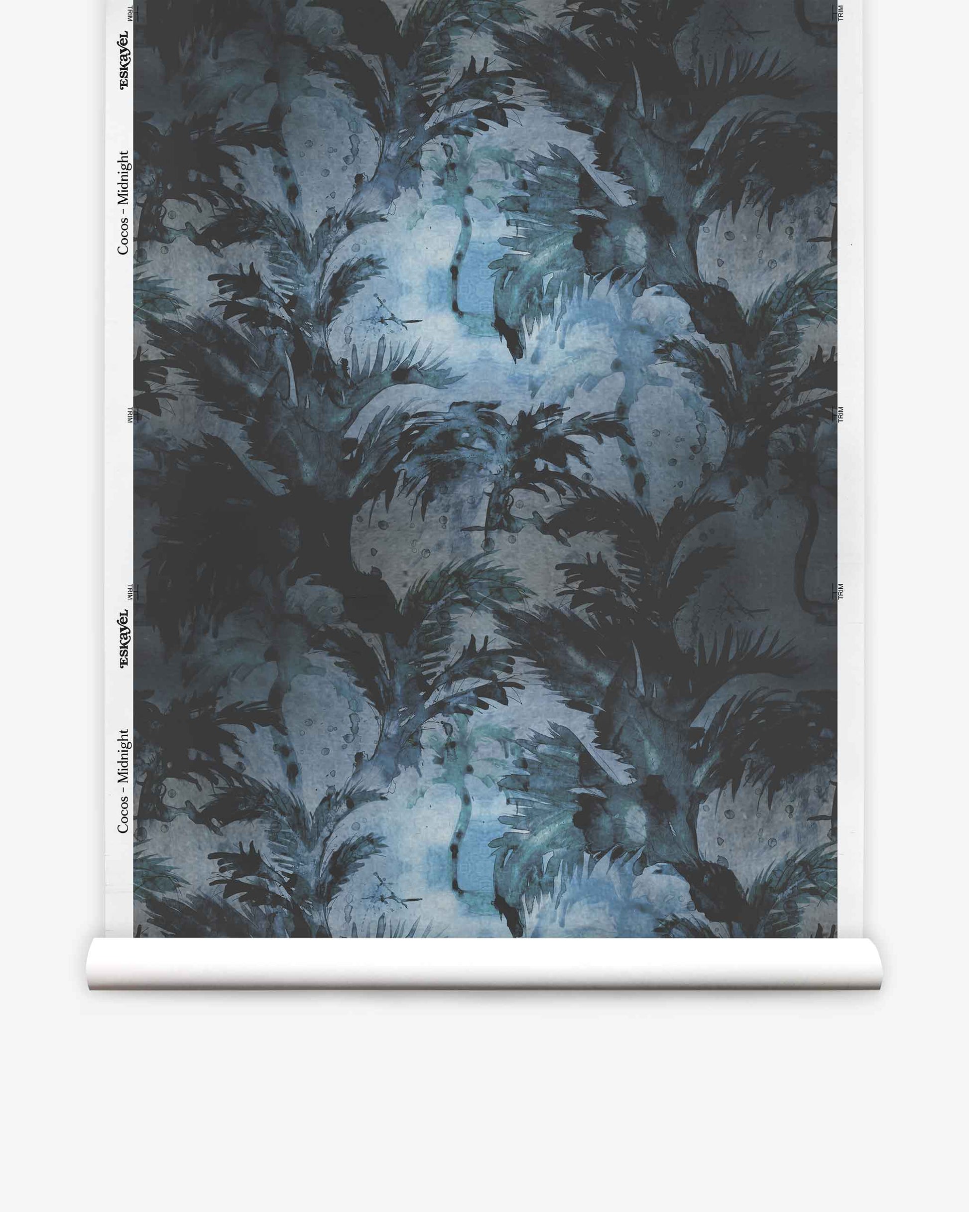 A roll of Cocos Silk Wallcovering in Midnight, featuring a luxury grasscloth design with dark blue and black abstract tropical foliage, palm leaves, and organic shapes.