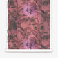 A roll of Cocos Silk Wallcovering in Persimmon, featuring an abstract pink and burgundy feather-like pattern, displayed vertically against a white background.