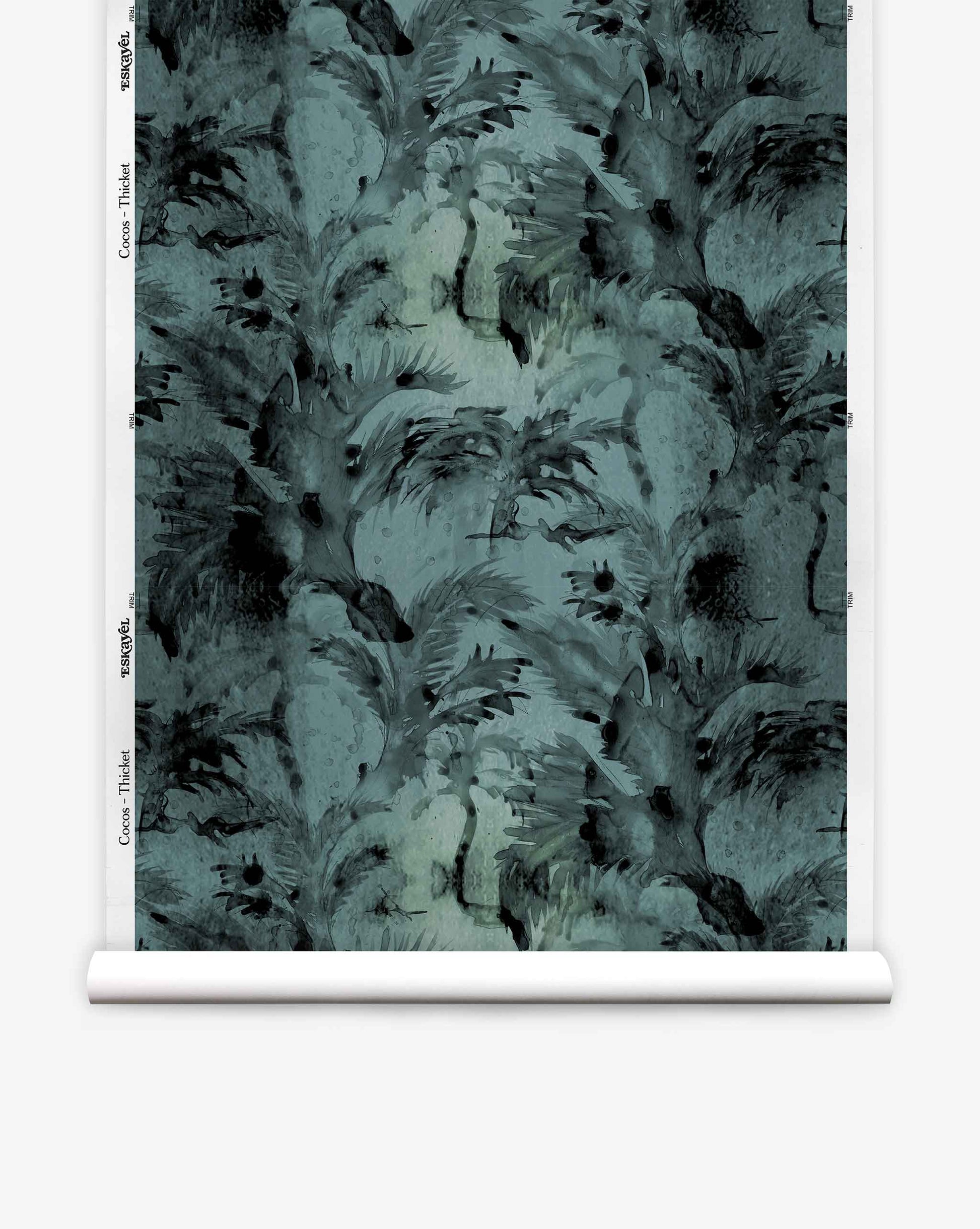 A roll of Cocos Silk Wallcovering||Thicket is displayed vertically against a white background, featuring a luxurious dark teal abstract feather pattern that evokes the refined texture of grasscloth wallpaper with subtle hints of palm tree motifs.