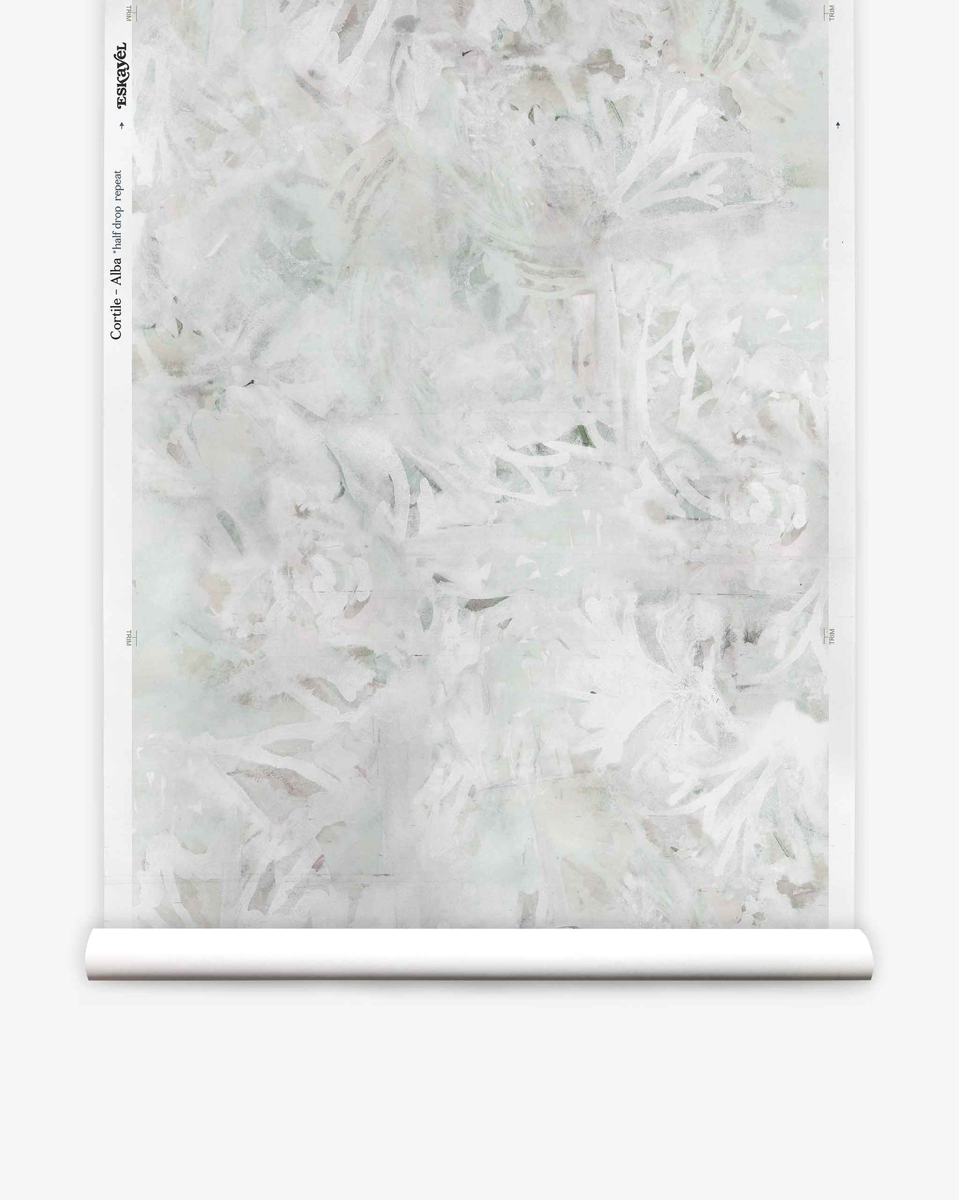 A roll of Cortile Silk Wallcovering||Alba, featuring a subtle pale botanical pattern in white and light gray reminiscent of an Italianate garden, is displayed against a plain white background.