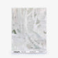 A sample of pale, abstract-patterned wallpaper with faded white and gray tones, reminiscent of a delicate watercolor design, labeled “Cortile Silk Wallcovering||Alba” at the bottom.