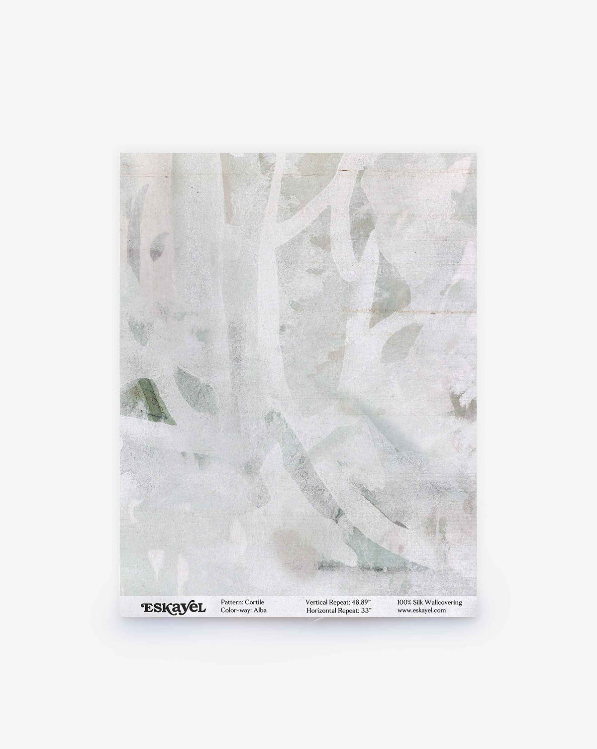 A sample of pale, abstract-patterned wallpaper with faded white and gray tones, reminiscent of a delicate watercolor design, labeled “Cortile Silk Wallcovering||Alba” at the bottom.
