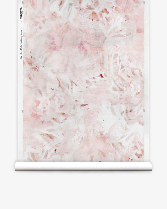 A roll of Cortile Silk Wallcovering||Pelle, showcasing a soft pink and white abstract floral watercolor pattern, displayed against a white background.