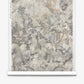A roll of Inflorescence Silk Wallcovering||Sol features a textured, marble-like pattern in muted gray, beige, and green on a white background.