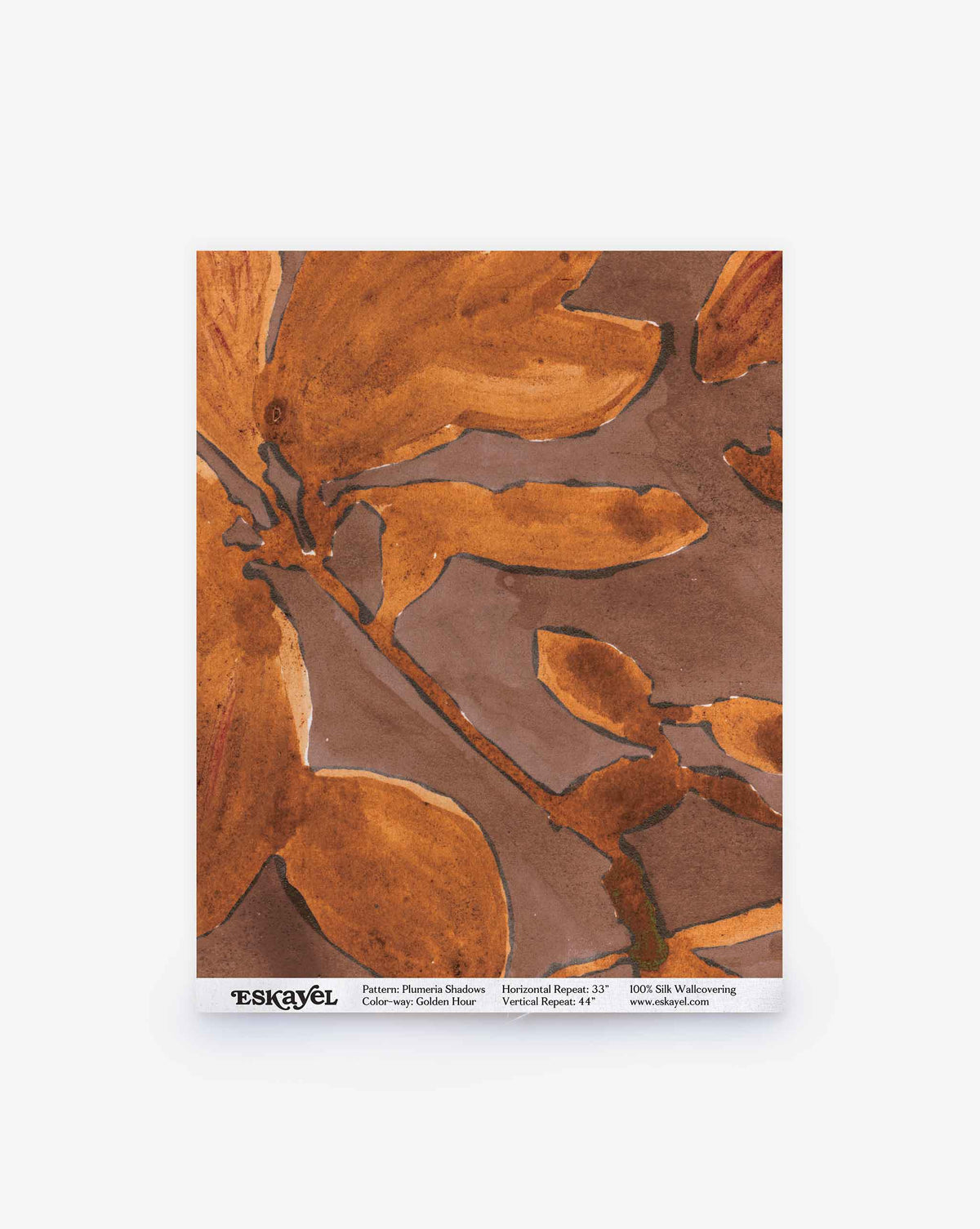 Abstract watercolor painting of large brown and orange leaves on a reddish-brown background, labeled as the Plumeria Shadows Silk Sample in Golden Hour by Eskayel. Order a sample to experience this unique wallpaper design in your space.