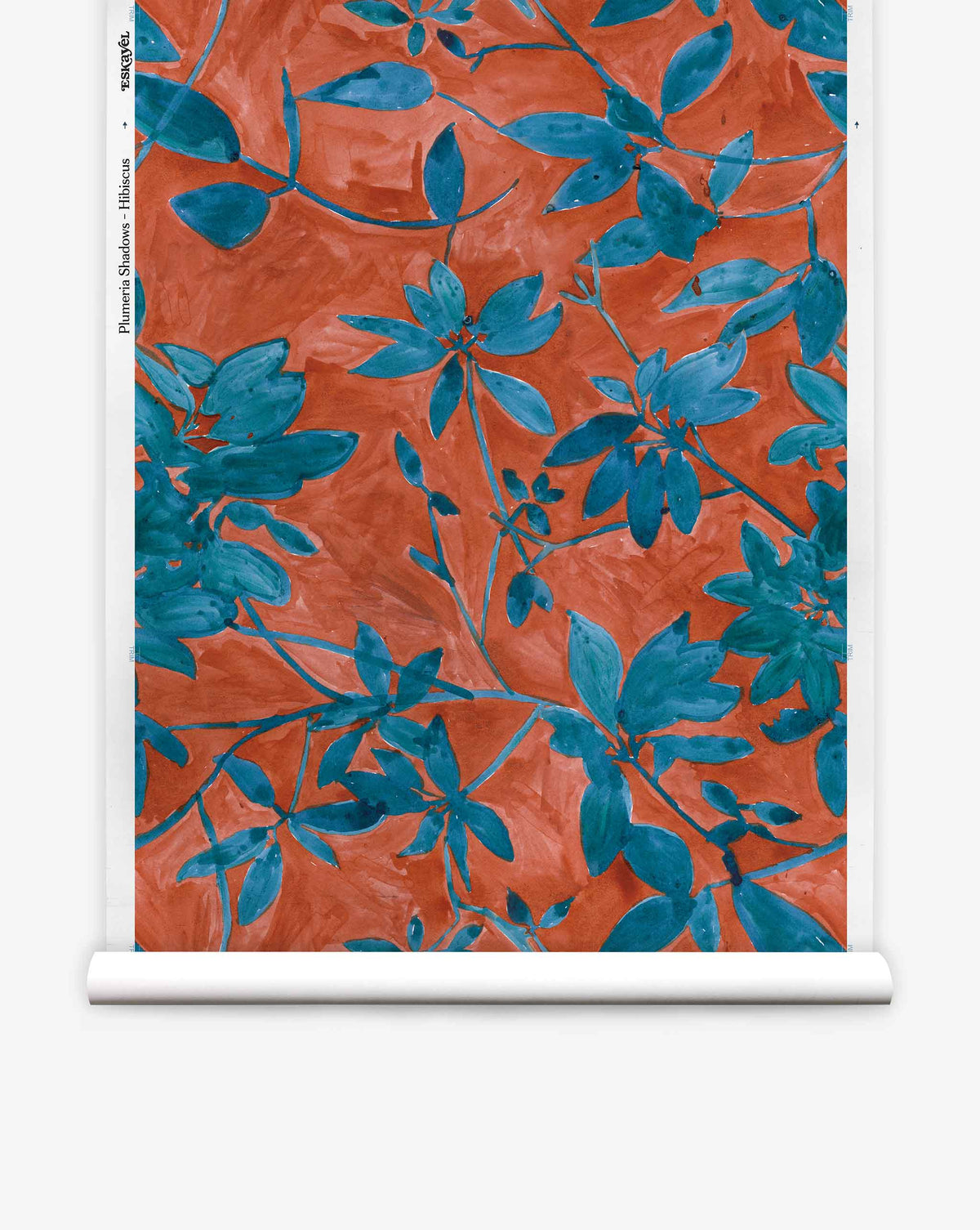 A roll of Plumeria Shadows Silk Wallcovering in the Hibiscus colorway, featuring a pattern of blue leafy branches set against a rich red-orange background.